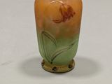 a small vase that is sitting on a table