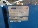 a label on the back of a blue machine