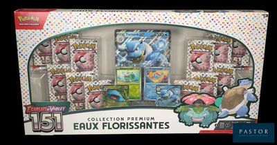 a box of pokemon cards with various items in it