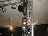 many lights that are on the ceiling of a room
