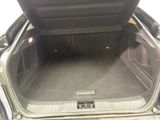 a trunk of a car with the back door open