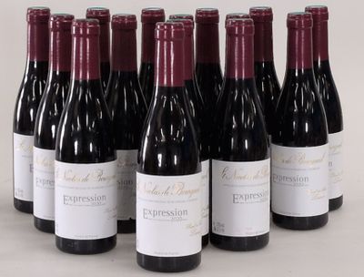six bottles of wine are lined up in a row on a table