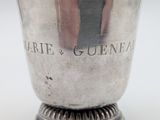 a silver cup with a handle that says marie gueneaux