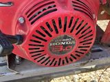 a close up of a red engine on a red motorcycle