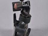 someone is taking a picture of a camera on a tripod