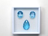 a picture of a picture of a face made out of blue gems