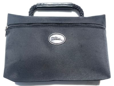 a black purse with a handle on a white background
