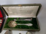 a box with silverware in it on a table