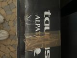 a black box with a sticker on it sitting on the floor