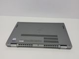a laptop that is sitting on a white table
