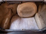 an image of a trunk of a car with the seat folded down