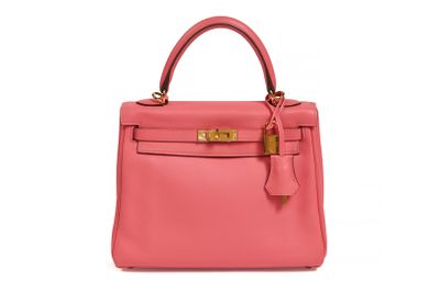 a pink leather handbag on a white background