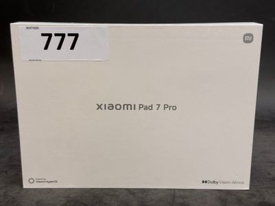 a white box with the number 777 on it sitting on a table