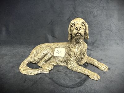 an image of a statue of a dog with a tag on it ' s collar