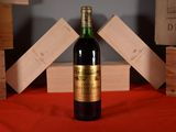 a bottle of wine that is sitting on a table