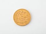 an image of a gold coin with the image of a man on a horse