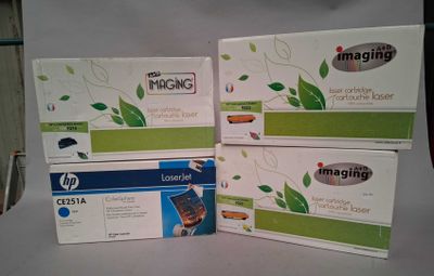 three boxes of ink cartridges are stacked on top of each other