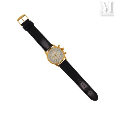 gros plan d'une montre sur fond blanc avec un bracelet noir