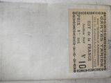 a label on a piece of fabric that is on a table
