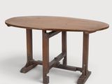 a close up of a table with a wooden top on a white background
