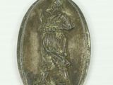 an image of a bronze medal with a man holding a sword