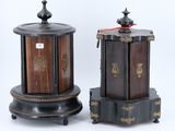 pair of asian style wooden boxes with metal decorations on stands