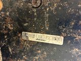 a close up of a piece of metal with a label on it