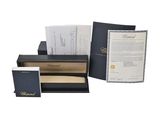 a black box with papers and a pen in it