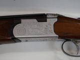 a close up of a shotgun with a gun in it