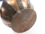a metal object that is sitting on top of a table