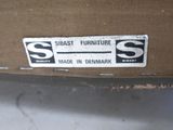 a sticker on the back of a suitcase that says sibast furniture made in denmark