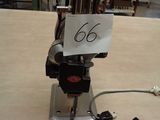 a machine that is sitting on a table with a sign on it