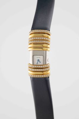 a close up of a wrist watch with diamonds on it
