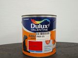 a close up of a can of paint on a table