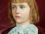 portrait of a young girl in a red dress with a white lace collar