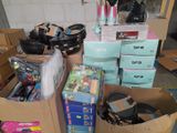 a pile of boxes and other items in a room