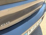 a close up of a car ' s emblem on the front of it