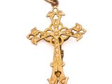 an image of a gold cross on a white background