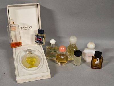 a box with perfume bottles and a perfume bottle in it