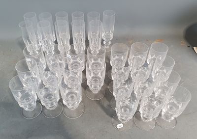 a lot of empty wine glasses on the table