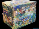 a box of pokemon trading cards on a black background
