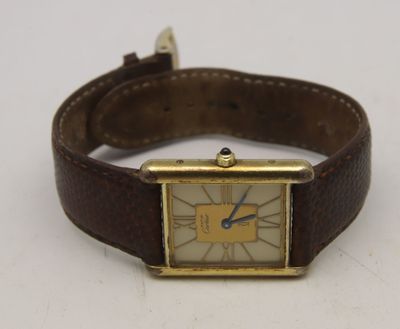 CARTIER Montre d'homme, argent plaqué or, cadrant rectangula…