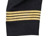 a close up of a navy officer ' s dress shirt with gold stripes