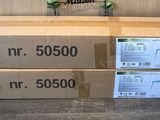 two boxes with flowers in them sitting on the floor