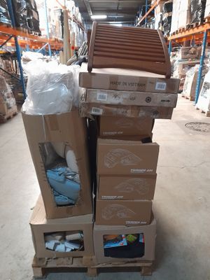 many boxes stacked on top of each other in a warehouse