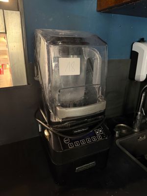 a blender that is sitting on a counter in a kitchen