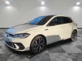 the white volkswagen golf is parked on a checkered tile floor