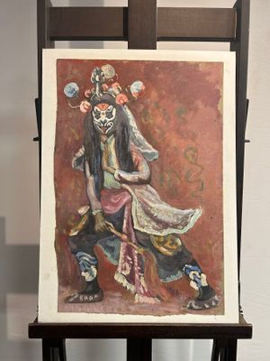 a painting on a easel with a painting of a woman