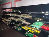 many different types of food on the shelves in the store