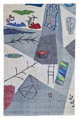 un gros plan sur un tapis orné de différents motifs